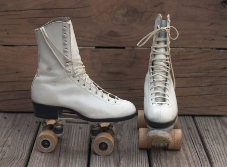 Old roller skates front and side view