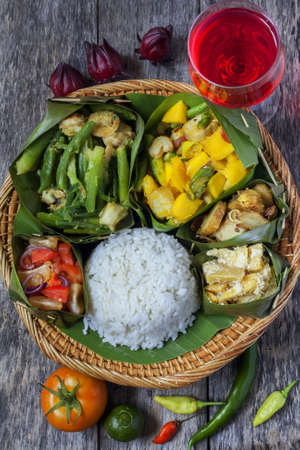 Set of KadazanDusun tribe traditional delicacies. Bambangan and white chili stir fry.People of North Borneo Island, Sabah Malaysia.の写真素材