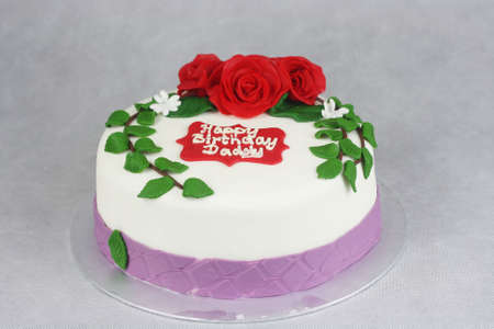 Rose decoration fondant cake in greyish backgroundの写真素材