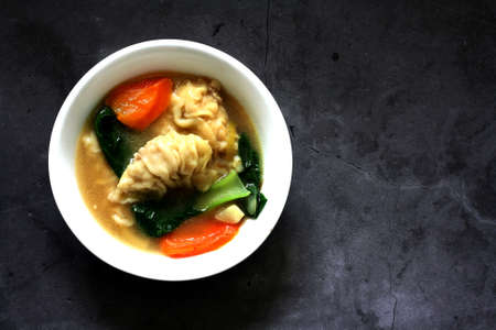 A wonton is a type of Chinese dumpling commonly found across regional styles of Chinese cuisine.の写真素材