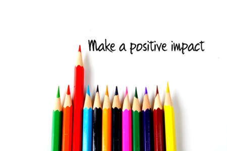 Make postivie impact motivation wording with color pencil backgroundの写真素材