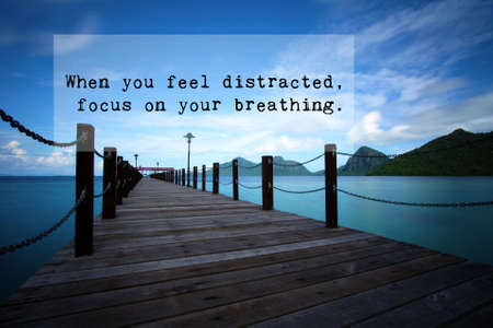 When you are distracted, focus on your breatning. Positive word to move on. Landscape backgroundの写真素材