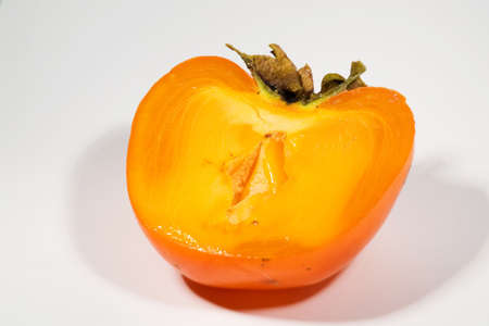 Persimmon isolated on white backgroundの写真素材