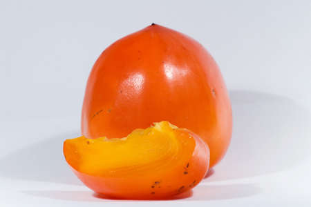 Persimmon isolated on white backgroundの写真素材