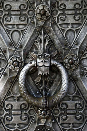 Old iron door with key-stoneの写真素材