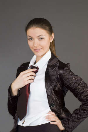 Attractive sexy business woman with cravat.の写真素材
