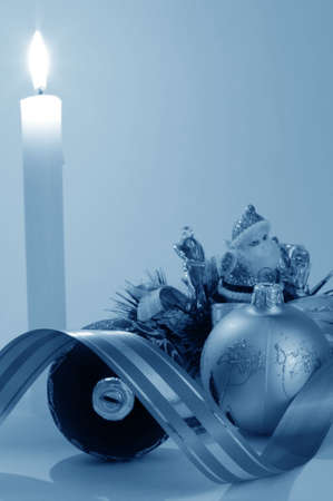 Santa in candles light and christmas ballの写真素材