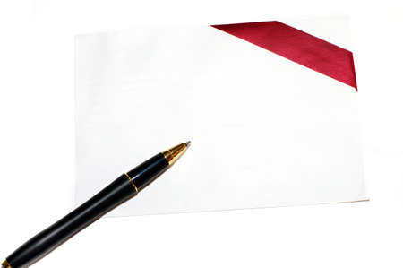 Diagonal red gift bow and blank card on white backgroundの写真素材