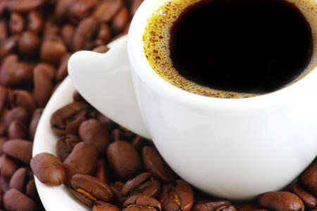 Coffee cup and coffee been arrownd の写真素材