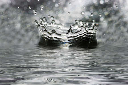 Fantastical water splashes. Drops, waves.の写真素材