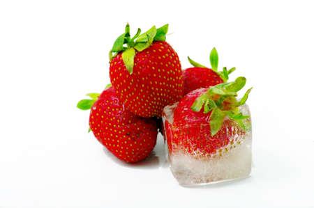 One strawberry into ice. Focus on the ice.の写真素材