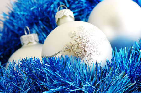 silver crystal balls with snowflake over blue backgroundの写真素材