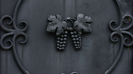 Metallic grape leaves and cluster ornamentsの写真素材