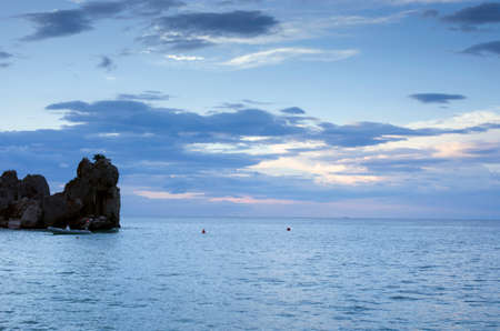 Majestic summer sunset over the seaの写真素材