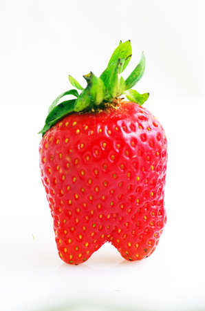 Healthy red strawberry fruit  isolated on the white background の写真素材