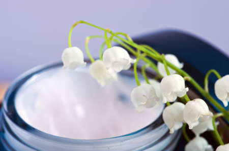 Flowers in a bowl color of brown with sea salt for SPAの写真素材
