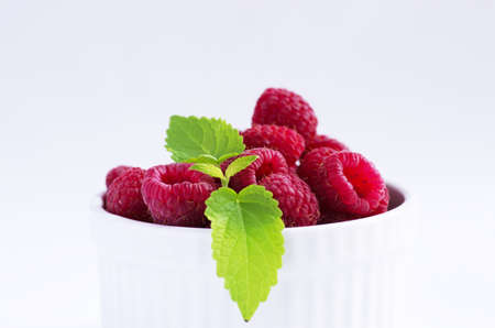 A beautiful selection of freshly picked ripe red raspberries