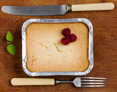 cake with raspberries and cream cheese decorated with fresh raspberries and mint. the toning....