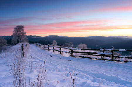 Sunrise in winter mountains . Sunrise in Carpathian Mountains, Ukraineの写真素材