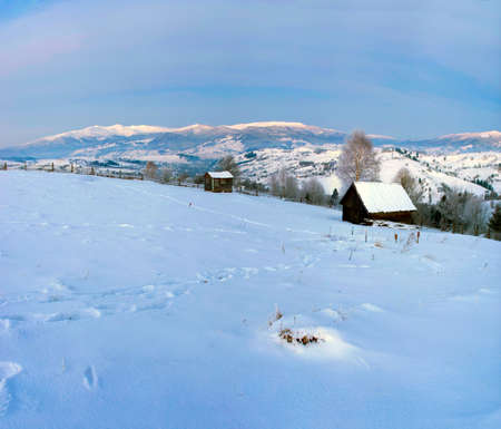 Carpathian mountain valley covered with fresh snow. Majestic landscape. Ukraine, Europeの写真素材