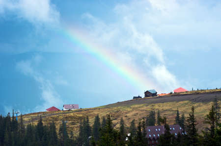 Mountain landscape with a rainbowの写真素材