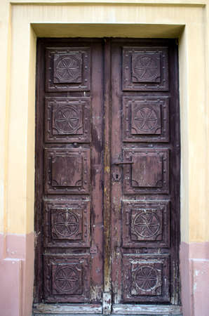 Old iron door with key-stoneの写真素材