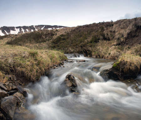 Beauty of Northern nature. Mountain river in spring landscapeの写真素材