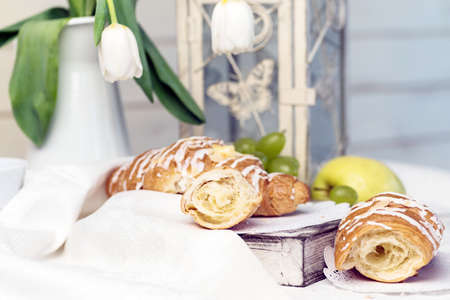 Fresh croissants with coffee cup for a breakfastの写真素材