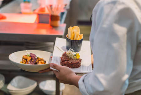 Beef tartare marinated with spices and served with toast