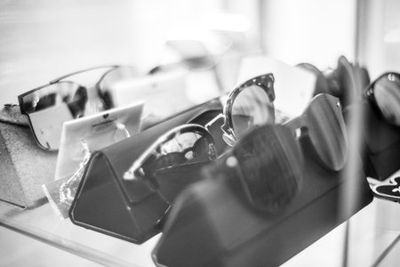 Sunglasses in a shop window. Black and white photos.の写真素材