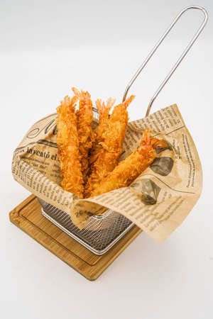 Ration of mozzarella sticks and nuggets in a barの写真素材