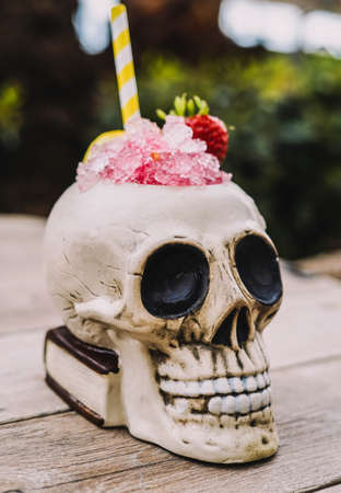 Tropical cocktail served in a skull-shaped glassの写真素材