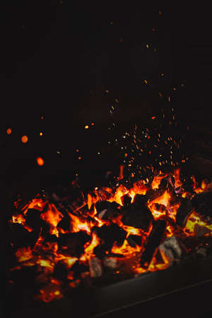 Image of burning coals in a restaurant grillの写真素材