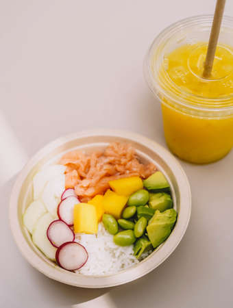 Acai bowl of salmon, rice and avocado
