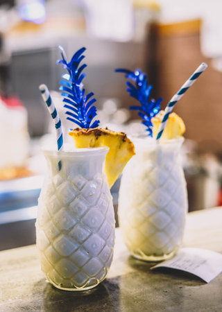 Coconut batida cocktail made with rum and pineappleの写真素材