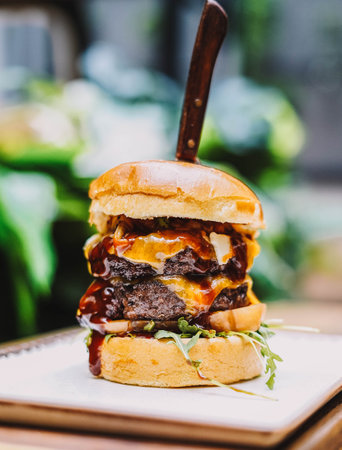 Tremendous double burger with extra cheddar cheeseの写真素材