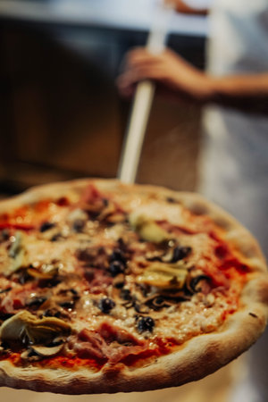 Homemade Italian-style pizza. Freshly kneaded dough, hand crushed tomatoes, and a perfect blend of mozzarella and Parmesan cheese make this pizza a true work of artの写真素材