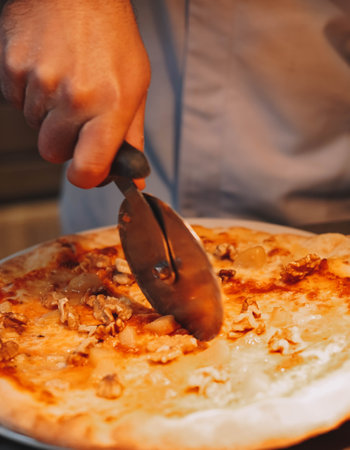 Homemade Italian-style pizza. Freshly kneaded dough, hand crushed tomatoes, and a perfect blend of mozzarella and Parmesan cheese make this pizza a true work of artの写真素材