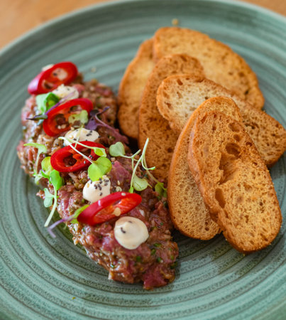 Girona sirloin tartar with focaccia croutonsの写真素材