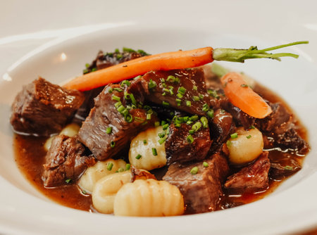 Gourmet gnocchi dish with beef raguの写真素材