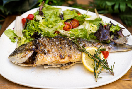 Dish rich in vitamins and minerals made up of fish and vegetables.
