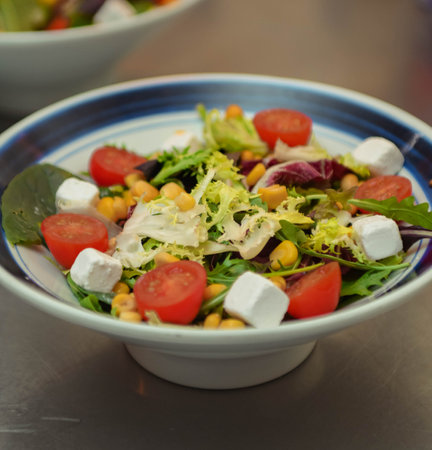 Fresh salad with Greek cheese and cherry tomatoesの写真素材