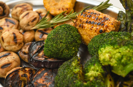 Delicious grilled vegetables and mushrooms in pan on table, closeupの写真素材