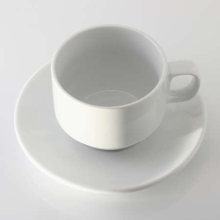 empty white cup isolated on the white backgroundの写真素材