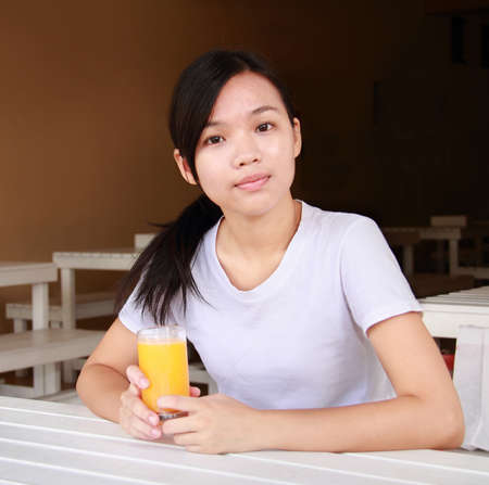Lady in a restaurantの写真素材