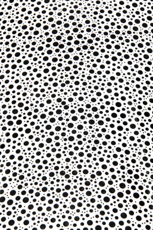 Grey and black color aluminium seamless pattern with round holesの写真素材