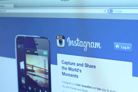 Johor, Malaysia - Sep 6, 2013: Photo of Instagram homepage on a monitor screen. Instagram is a free photo sharing application that allows users to take photos, apply a filter, and share it on the service or a variety of other social networking services, Sのeditorial素材