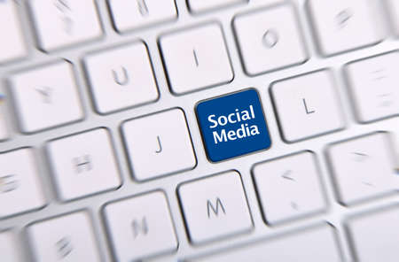 Photo of social media key button on the white keyboard の写真素材
