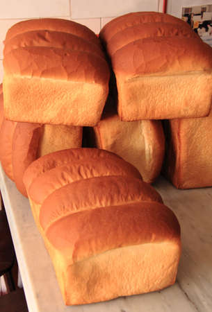 A lot of traditional homemade toasted bread on the tableの写真素材