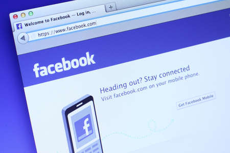 Johor, Malaysia - Sep 6, 2013: Photo of Facebook homepage on a monitor screen. As of today, Facebook is the largest social media network on the web, Sep 6, 2013 in Johor, Malaysia.のeditorial素材